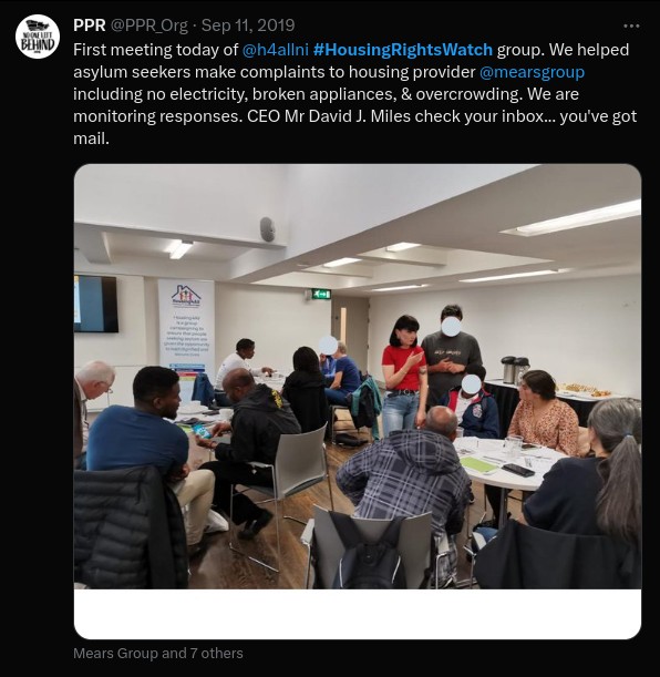 A tweet displaying a room full of people filling in housing rights complaints